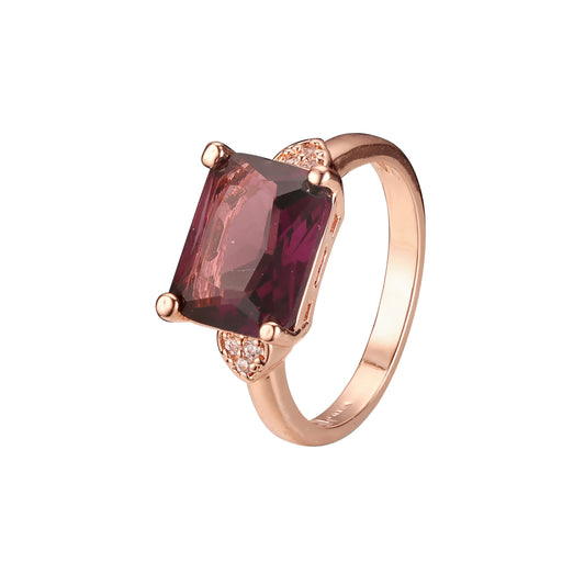 Rose Gold solitaire emerald cut stone rings