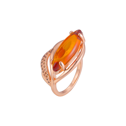 Крупные кольца-солитеры с оранжевым камнем Marquise, покрытые розовым золотом