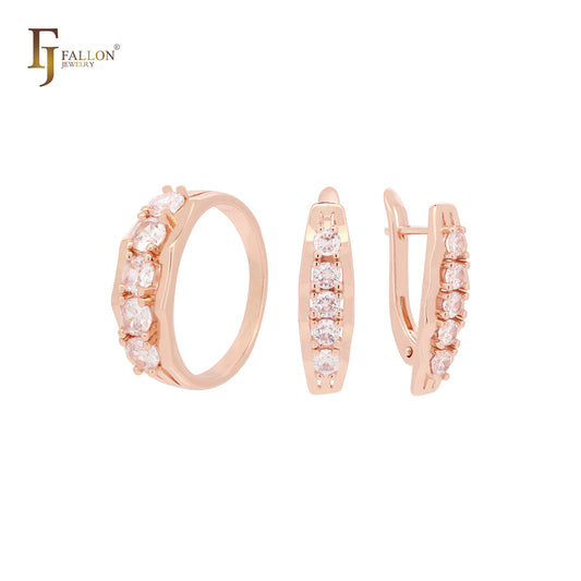Conjunto de joyería de oro rosa con cinco circonitas blancas redondeadas en racimo y anillos
